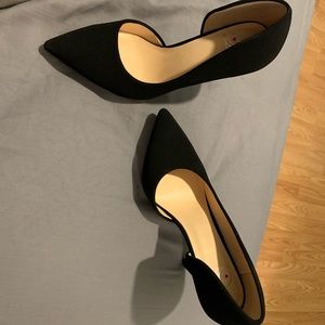 Black pointed toe heels